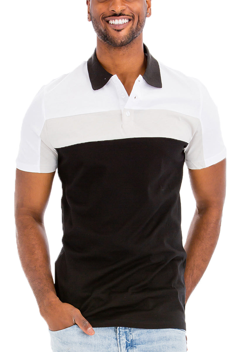 TADAJ Heritage Polo Shirt in black, white, and light gray color block style, combining timeless design with modern comfort.
